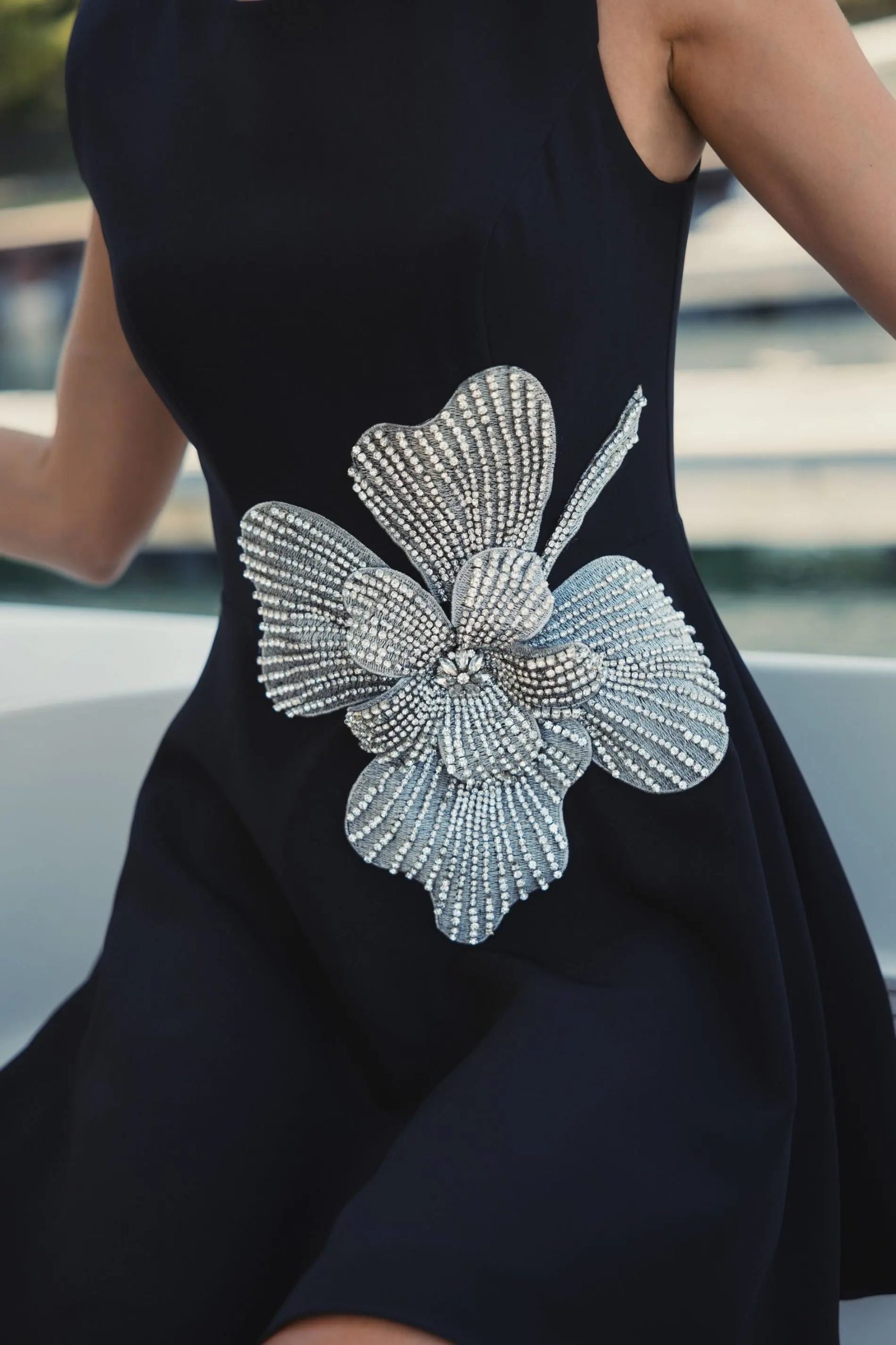 Black Sleeveless Crepe Mini Dress With Rhinestone Flower - Image 5