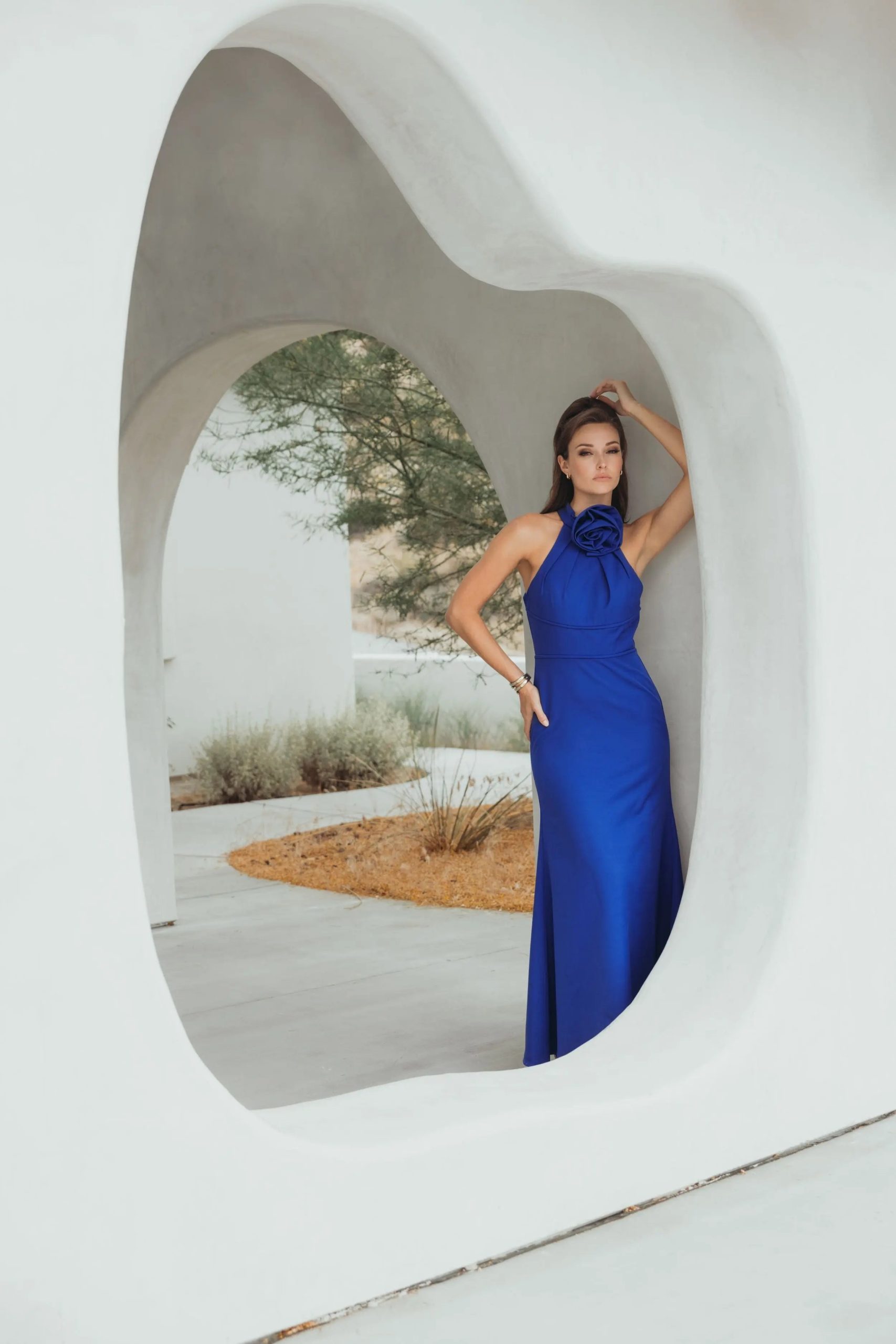 Blue Sleeveless Halter Neck Gown with Rosette Detail - Image 4